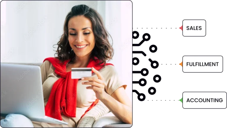 a woman entering her credit card information on her laptop